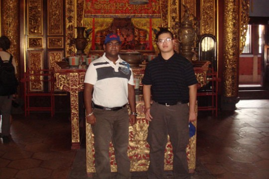 Two student posing in room