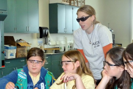 Girl scouts working on experiment