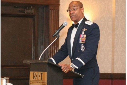 Person giving speech at podium