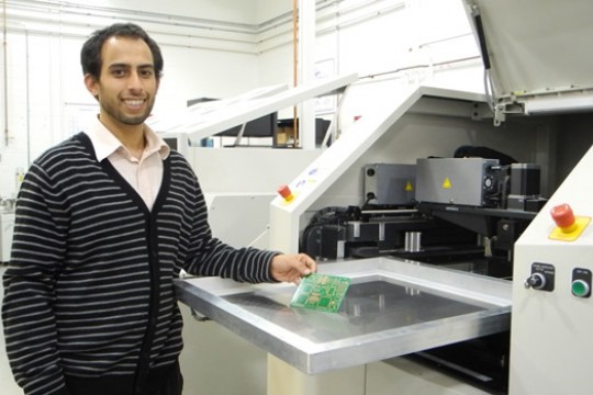 Person using machine in lab
