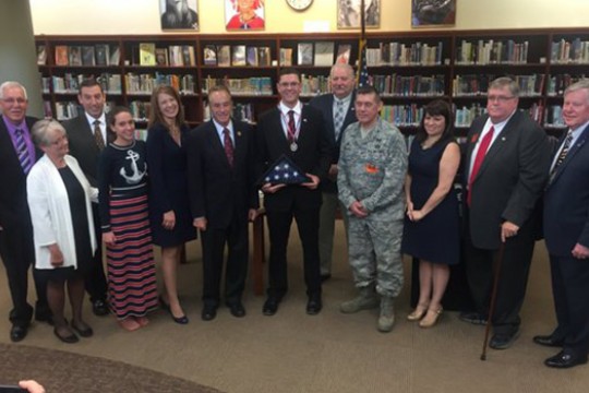 People gathered for picture in library