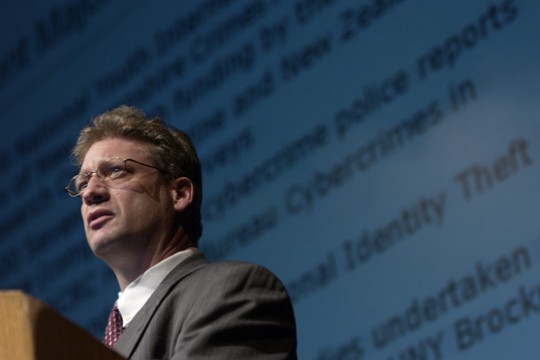 Professor giving speech at podium