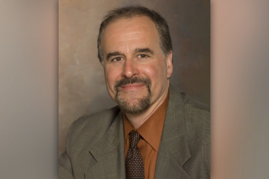 Professor posing for camera