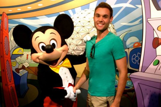 Person posing with Mikey Mouse