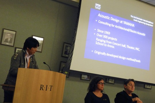 Person giving speech at podium