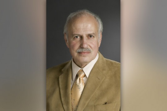 Professor posing for camera