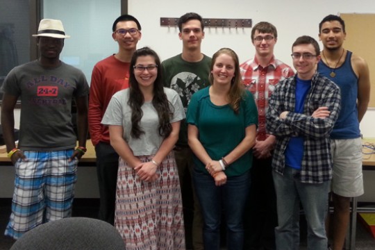 People gathered in classroom for picture