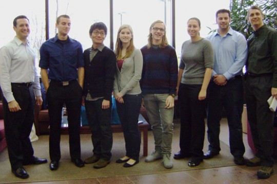 People posing for camera