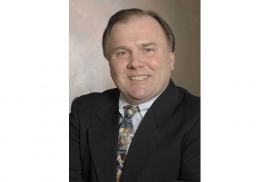 Professor posing for camera