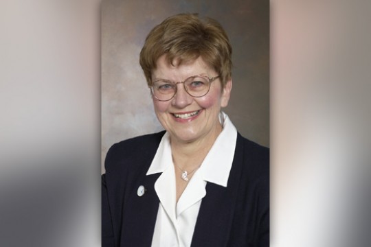 Professor posing for camera