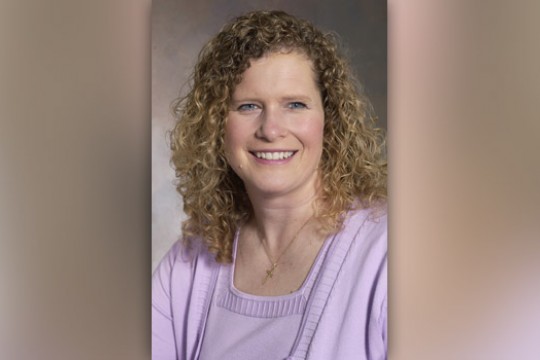 Professor posing for camera