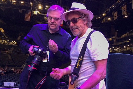 William Snyder talks with a member of The Who.