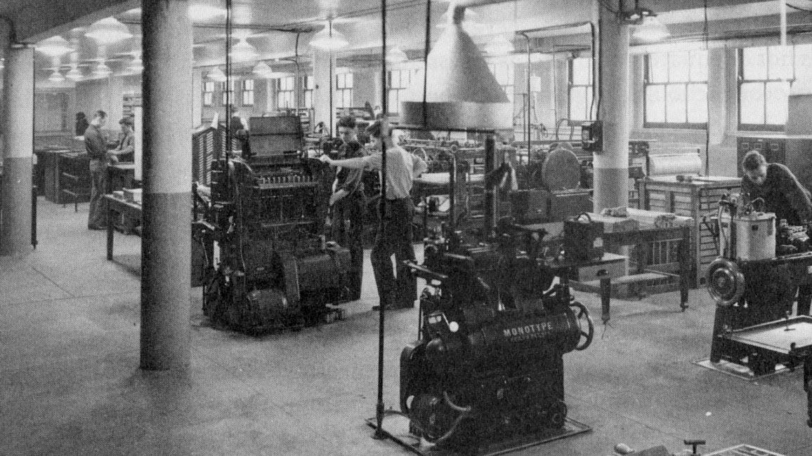 A large room with many presses.