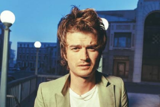 Djo with blue background