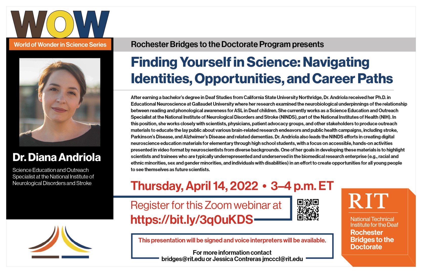 A white woman with short dark hair wearing a black shirt stands outside with a view of a city behind her.