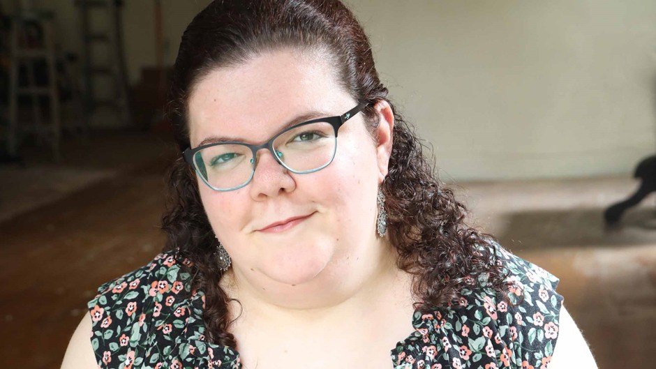 Headshot of disability rights activist Emily Ladau. 