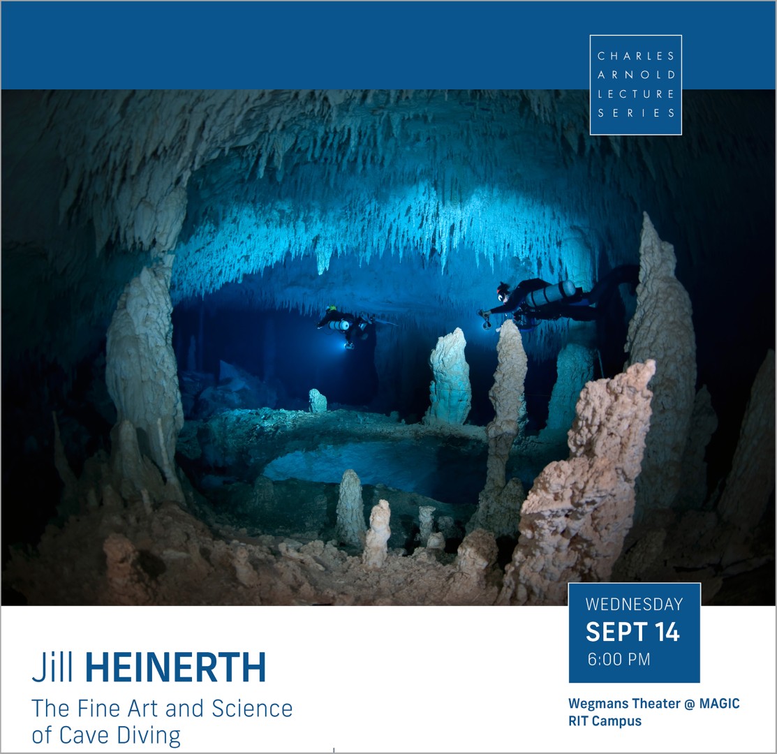 An underwater cave with divers exploring it.