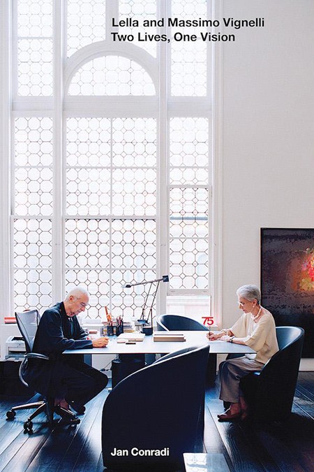 Massimo and Lella Vignelli working across from each other.