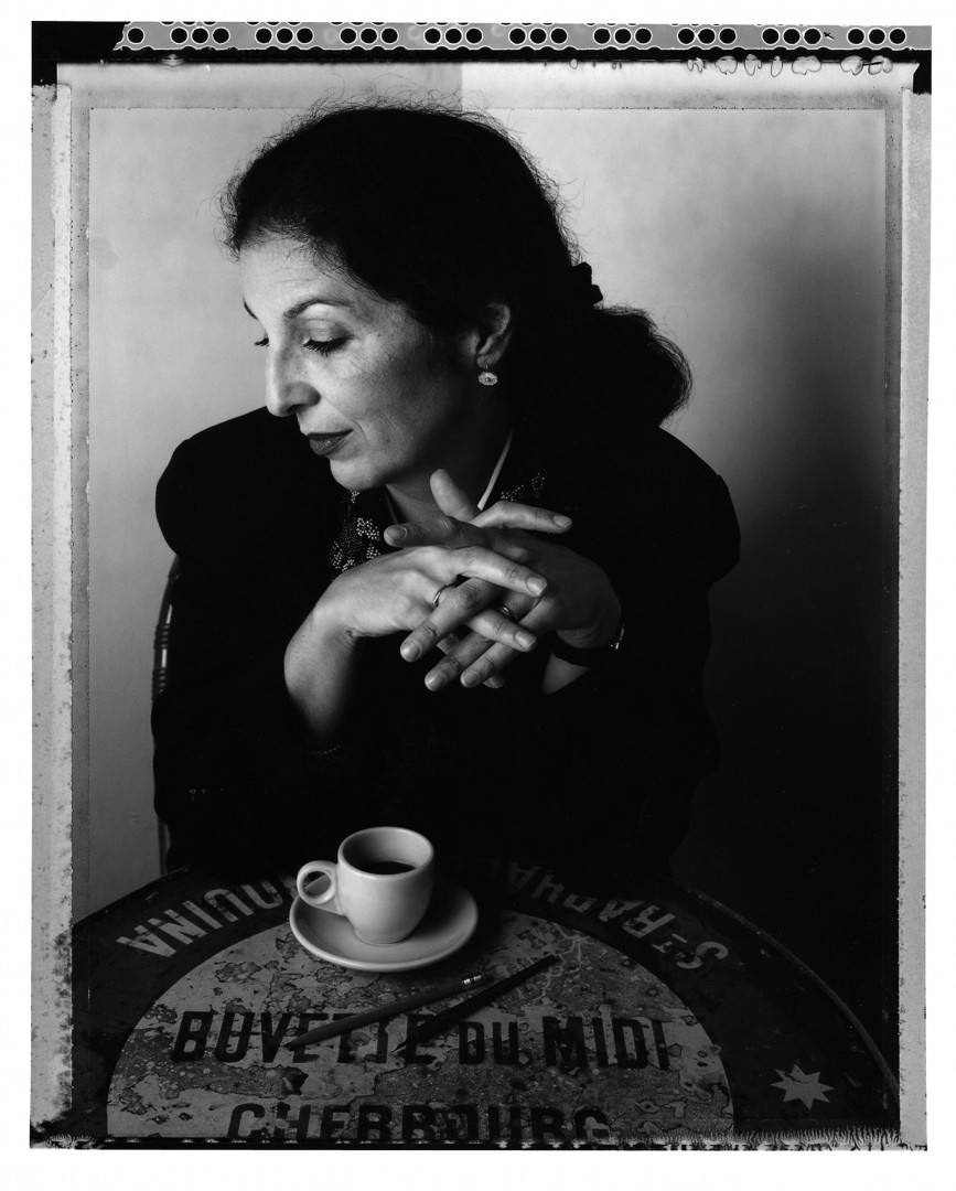 A black-and-white portrait of Louise Fili.
