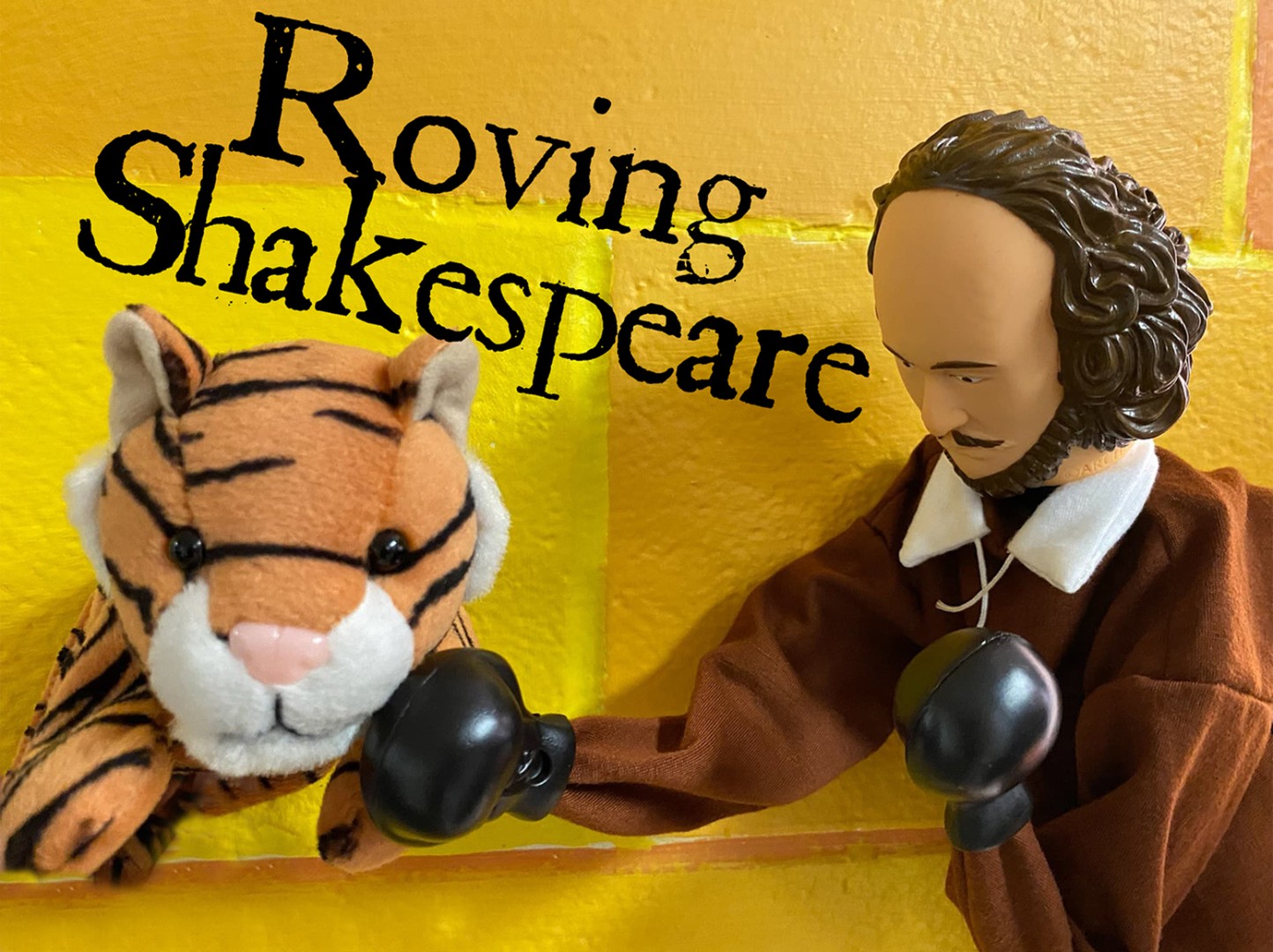 Image of two puppets: one is a tiger and the other is William Shakespeare. The title reads: Roving Shakespeare