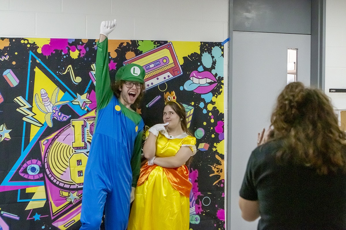 Students dressed as Luigi and Princess Peach.