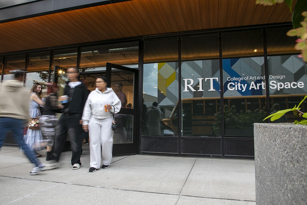 People file into RIT City Art Space.