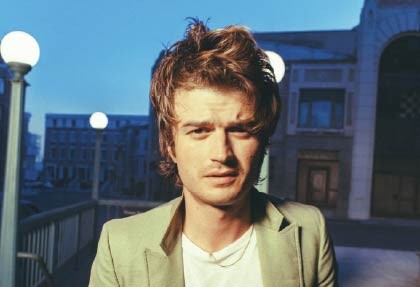 Djo with blue background