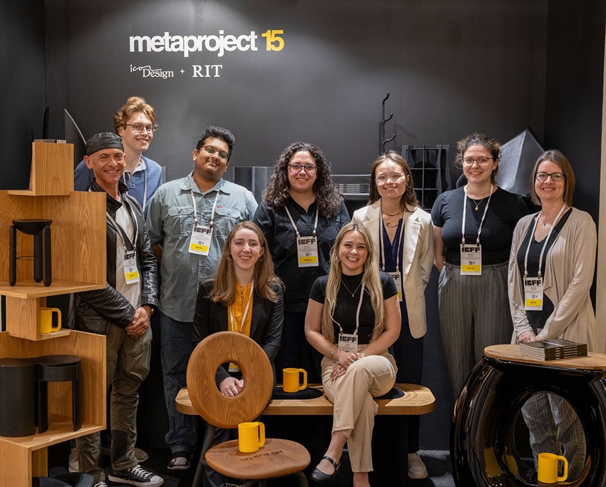 A group of students next to designs they made for the 2025 International Contemporary Furniture Fair.