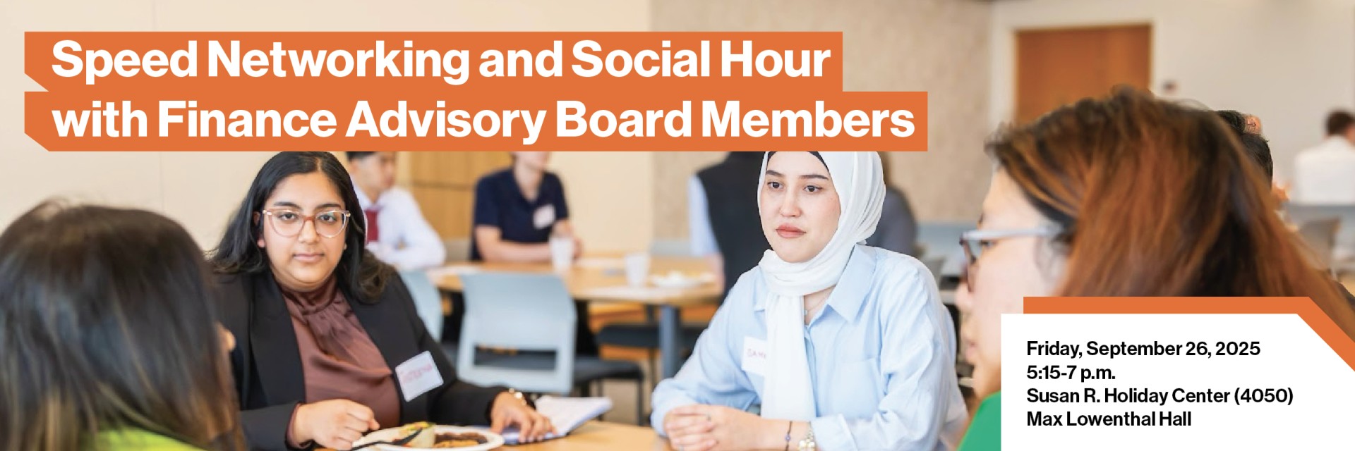 students around a table chatting