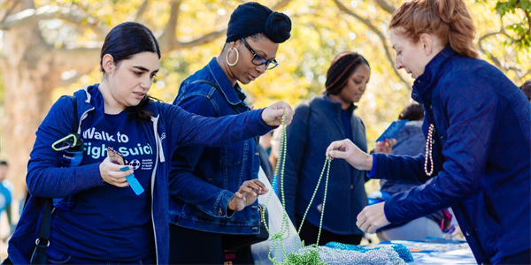 Students engaging with Honor Bead Project