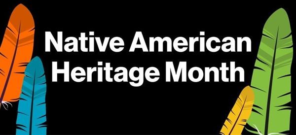 Black background with white lettering saying Native American Heritage Month with colorful feathers surrounding it 