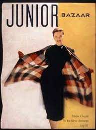 Cover of Junior Bazaar magazine, July 1947, model in black dress and checked coat, photographed by Richard Avedon