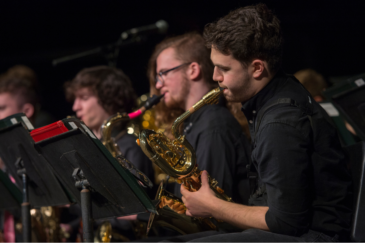 Student playing a saxophone