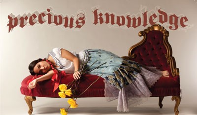 precious knowledge text with women in dress laying on couch