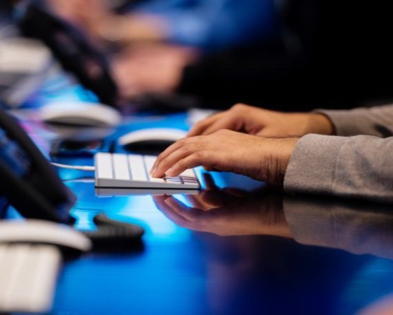 fingers at a keyboard