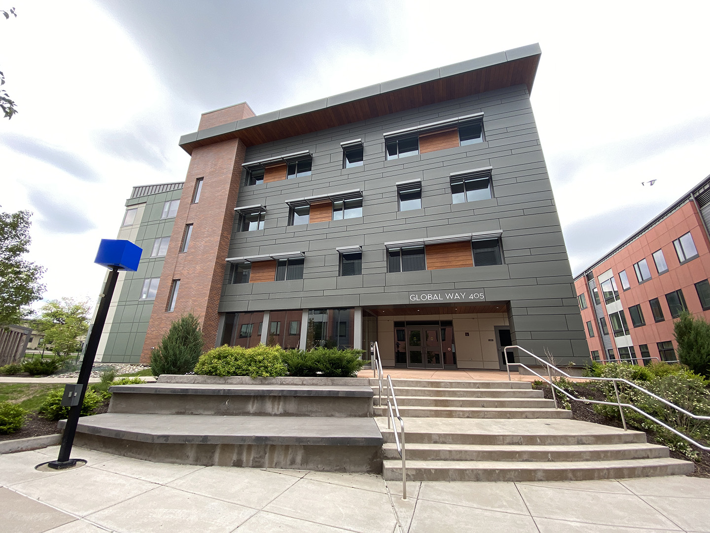 view looking up of grey residence building