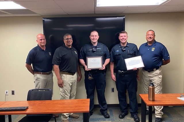Five public safety officers with certificates