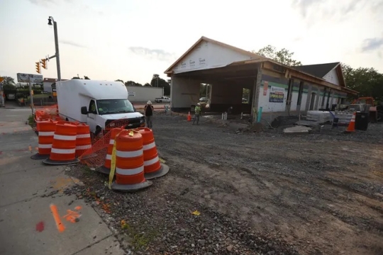 Car wash building under construction. 