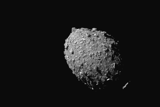 closeup of an asteroid in space.