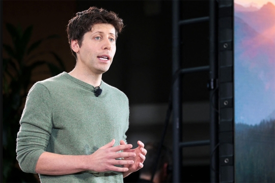 person wearing a microphone and talking.