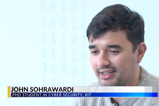 John Sohrawardi appears on WROC-TV with a chyron displaying his name