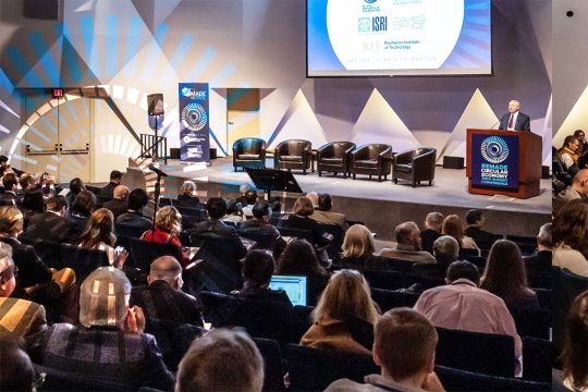 an image of the 2023 REMADE conference with Nabil Nasr appearing on stage.