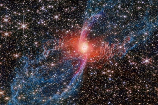 The Red Spider Nebula is shown with more detail than ever against a backdrop of thousands of stars.