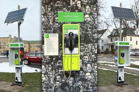a view of payphones with a solar panel above them