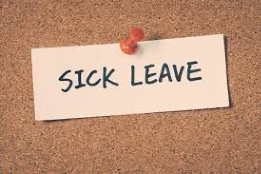 a sign on a bulletin board reads Sick Leave