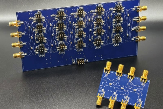 a Fabricated unitary universal device and its power-divider layer.