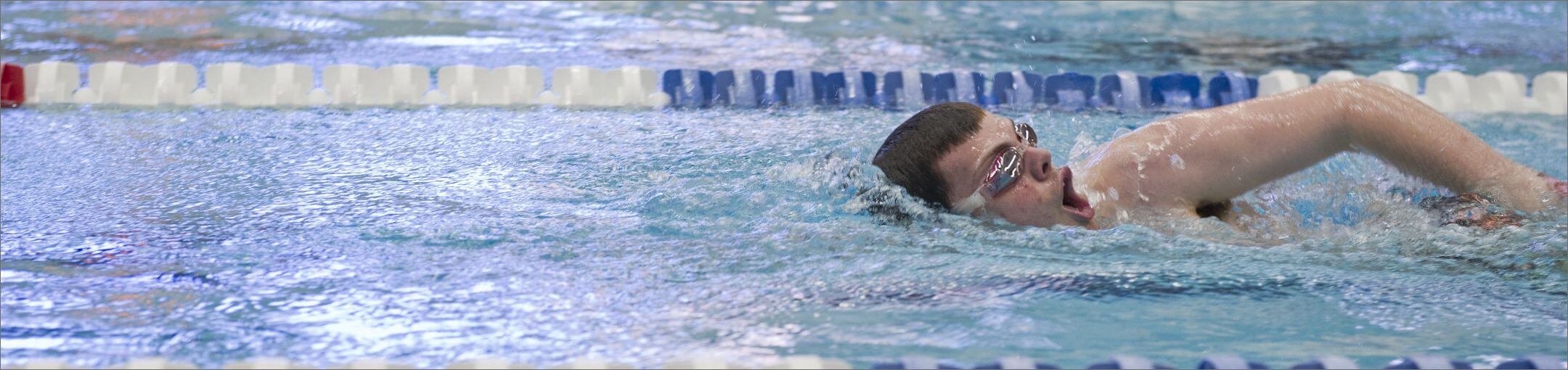 A student swimming.