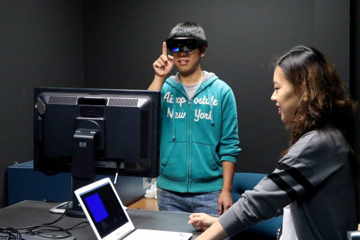 Student using eye-tracking glasses.