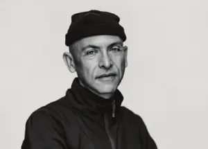 A black and white headshot of Josh Owens.