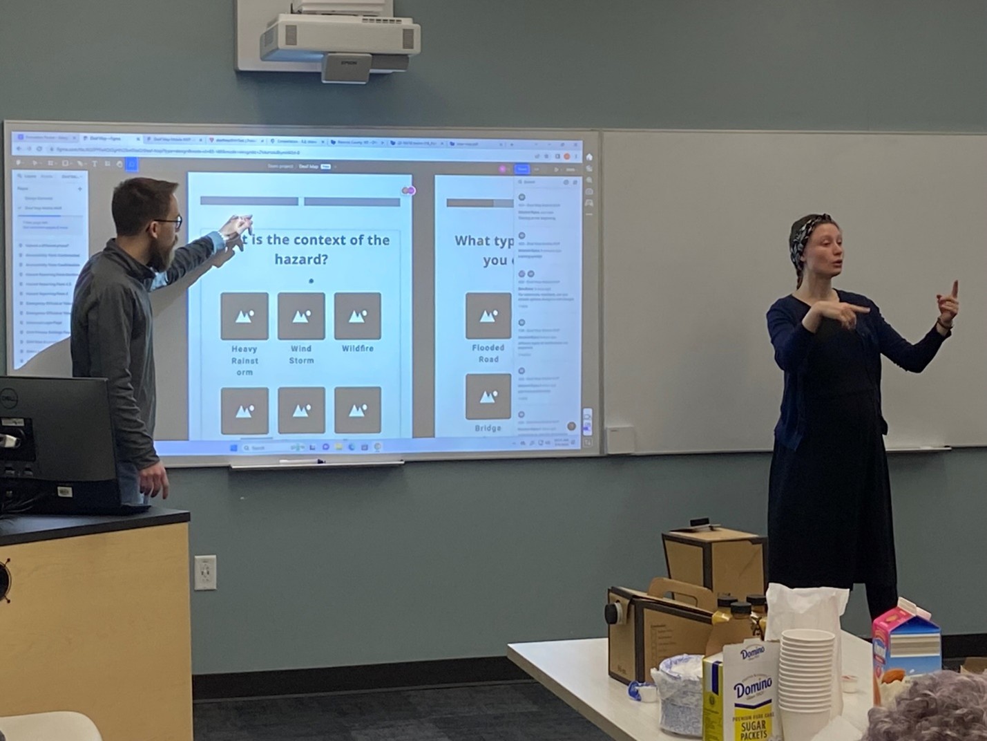 RIT HCI student evaluating Deaf Map with RRCD members